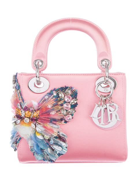 christian dior butterfly bag.